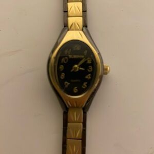 Elgin women’s dress two tone watch a beautiful black and gold watch running
